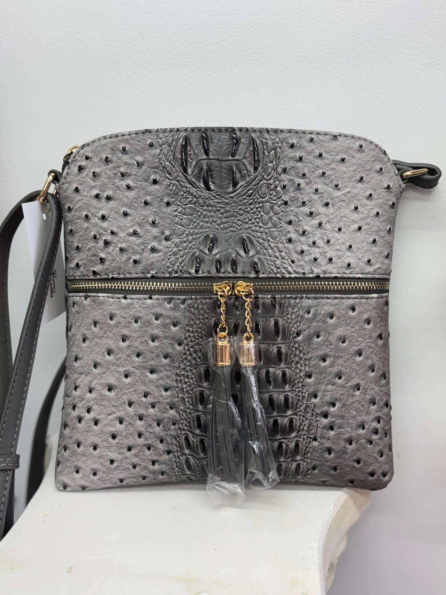Ostrich/Crocodile print crossbody purse.