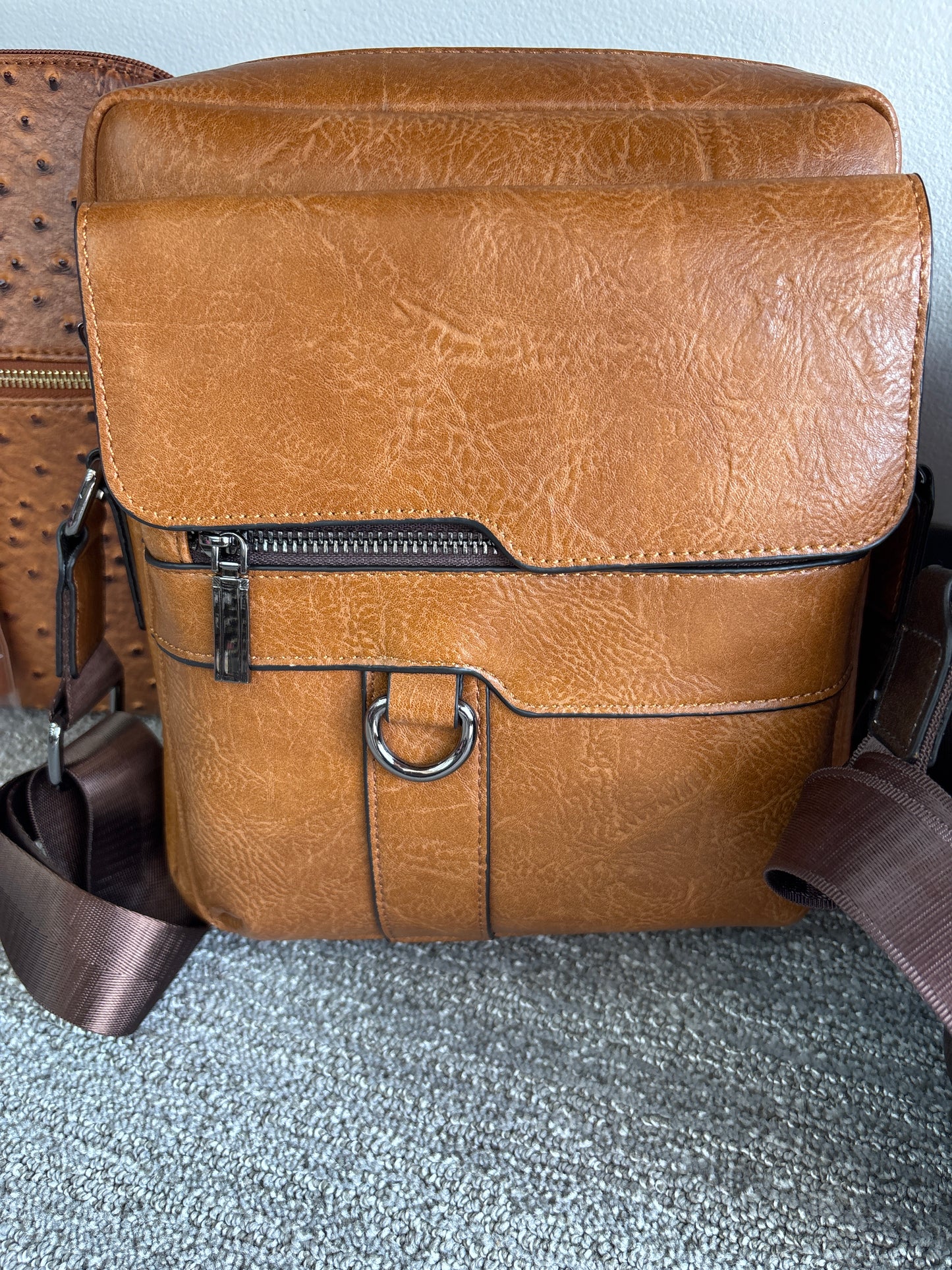 Faux leather crossbody.
