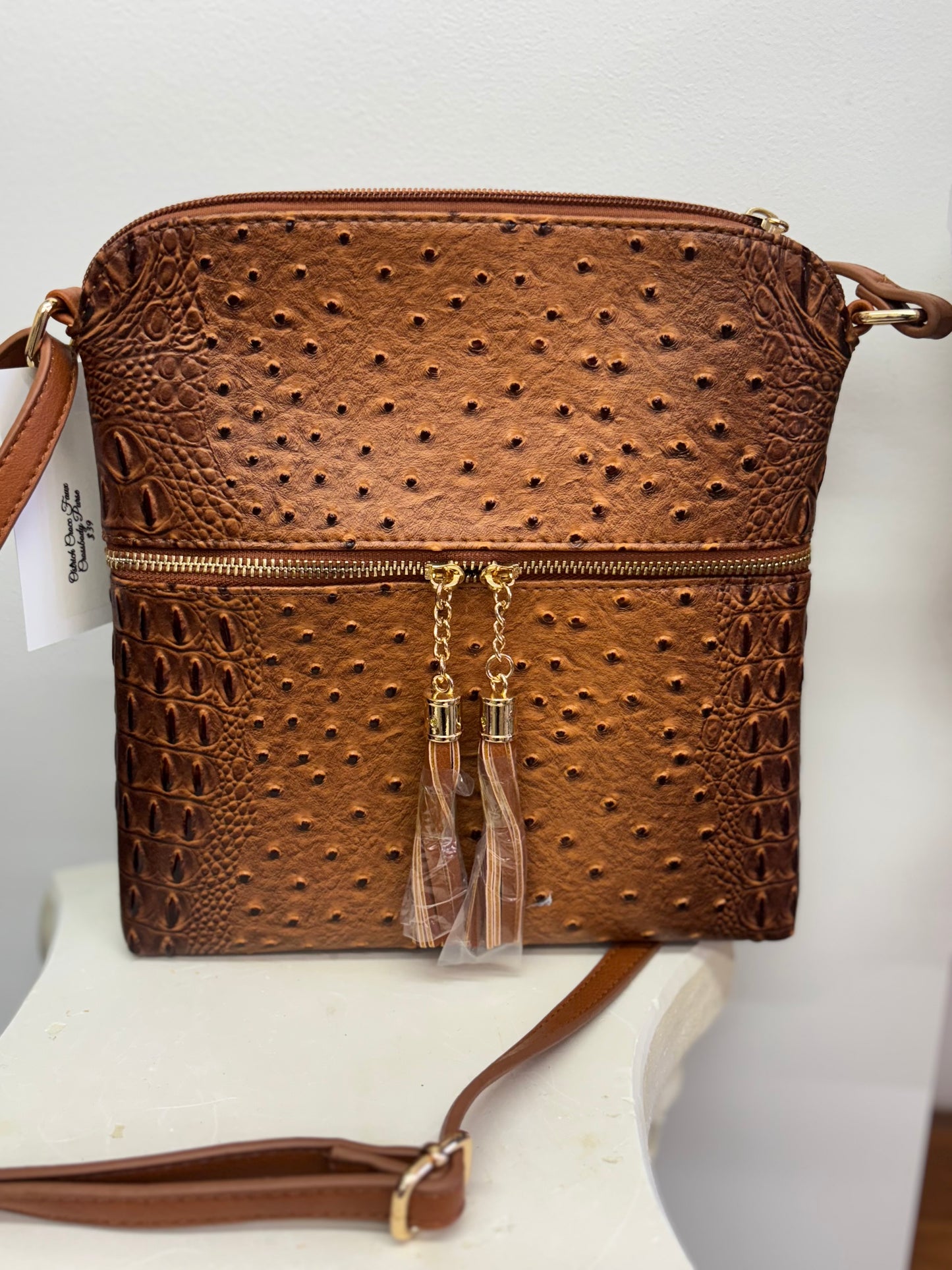 Ostrich/Crocodile print crossbody purse.