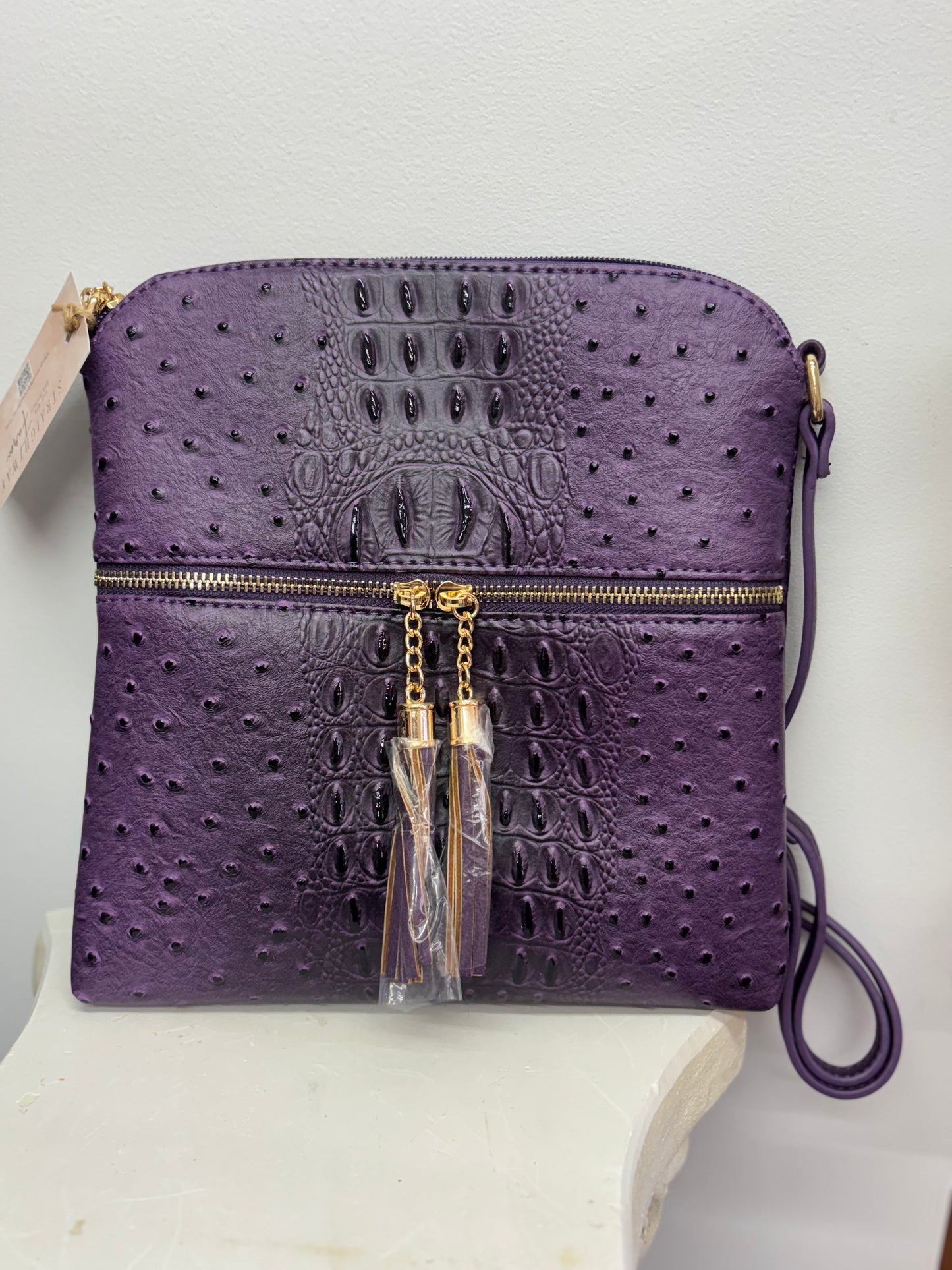 Ostrich/Crocodile print crossbody purse.