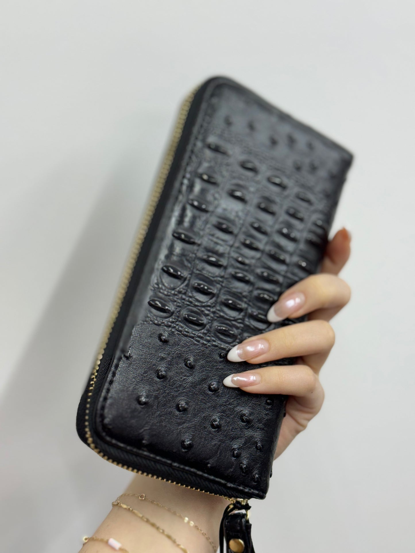 Classy black faux alligator textured wallet.